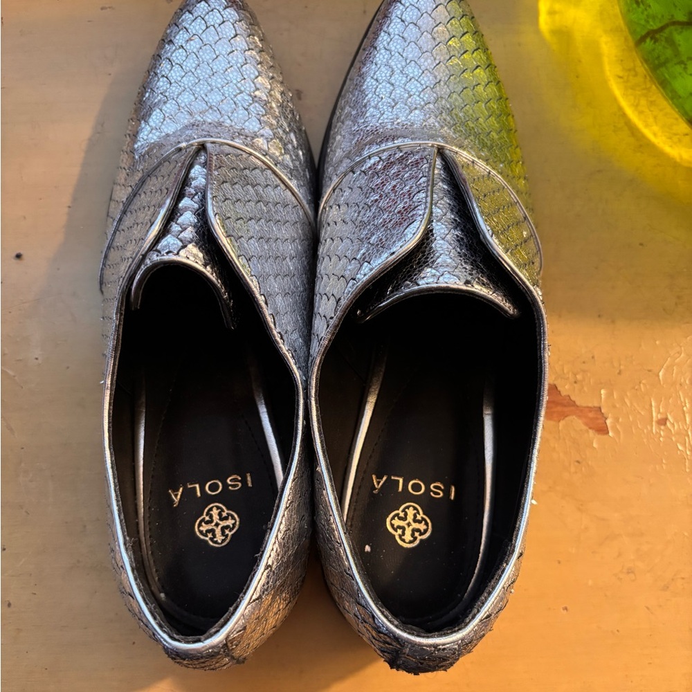 Brand new ...silver slip on shoes